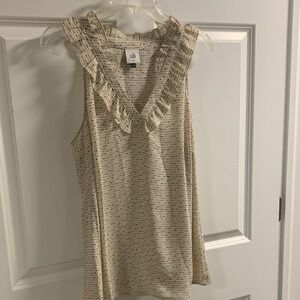 CAbi Cream Sleeveless Blouse with Ruffle Detail